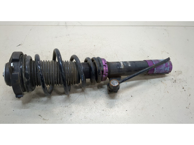 Стойка амортизатора  Volkswagen Caddy 2010-2015      