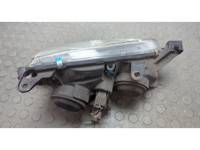 Фара передняя  Toyota Avensis 1 1997-2003 левая 