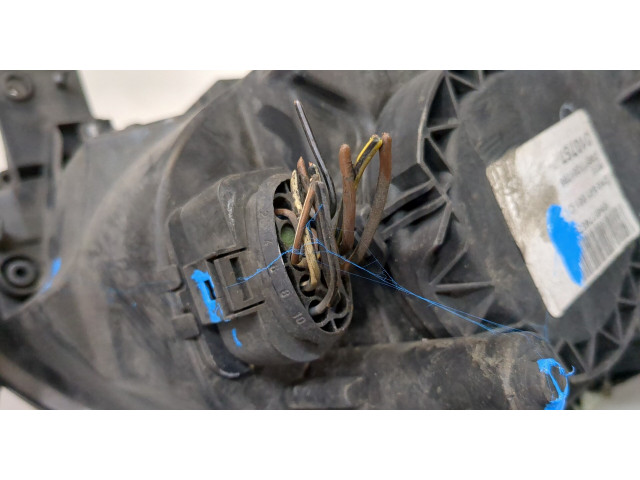 Фара передняя  Volkswagen Caddy 2004-2010 левая 