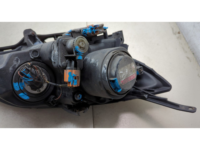 Фара передняя Mazda 3 (BK) 2003-2009 левая