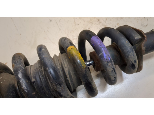 Стойка амортизатора Mitsubishi L200 2015-2019 2.4 дизель