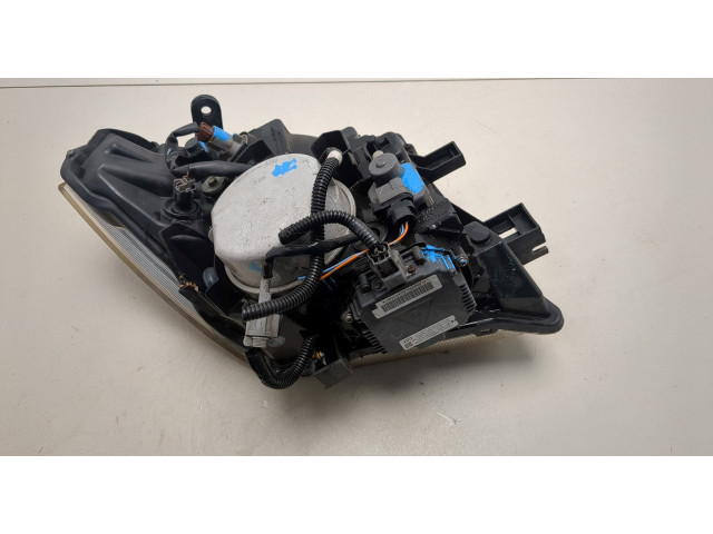 Фара передняя Nissan Pathfinder 2004-2014 левая