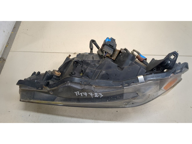 Фара передняя Mitsubishi Outlander XL 2006-2012 левая