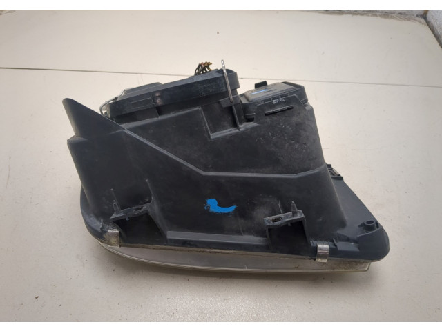 Фара передняя  Volkswagen Bora левая 