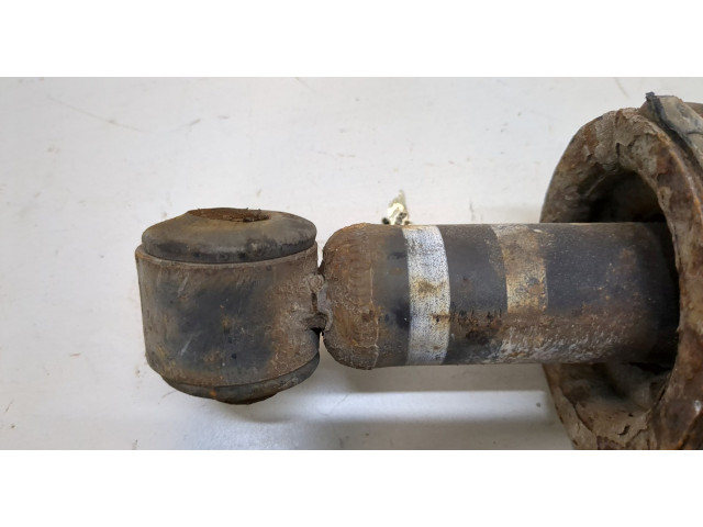 Стойка амортизатора Mitsubishi Lancer 9 2003-2006