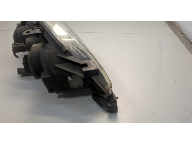 Фара передняя  Toyota Avensis 1 1997-2003 левая 