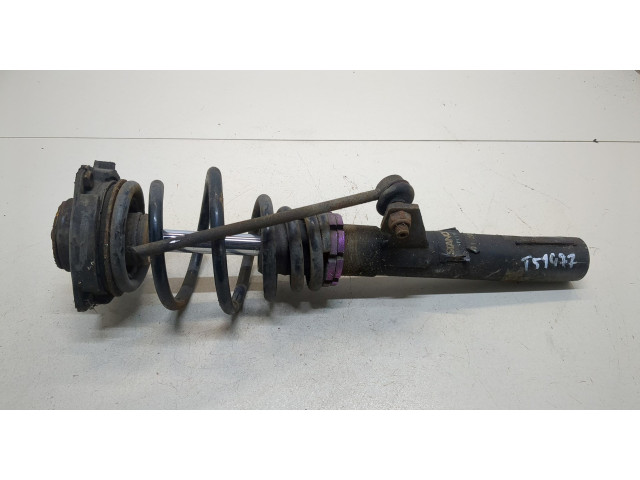 Стойка амортизатора Volkswagen Caddy 2004-2010