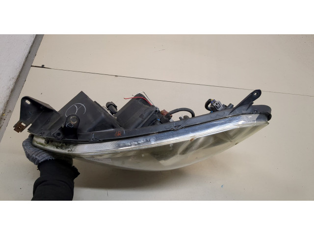 Фара передняя  Toyota Corolla Verso 2004-2009 левая 