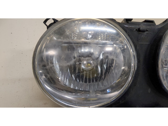 Фара передняя Jaguar XJ 2003–2008 левая