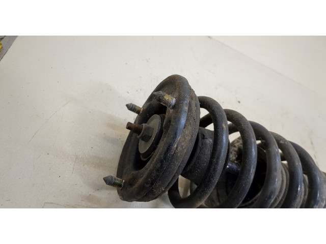 Стойка амортизатора Mitsubishi Galant 1997-2003