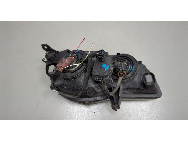 Фара передняя  Toyota Corolla E11 1997-2001 левая 