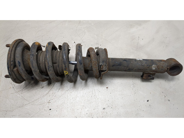 Стойка амортизатора Mitsubishi L200 2006-2015