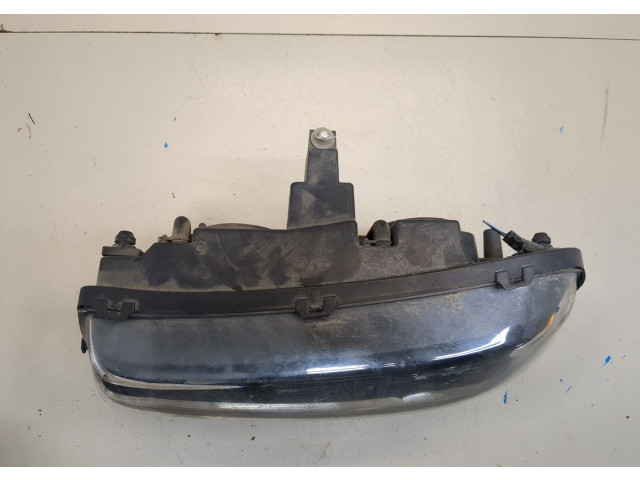 Фара передняя  Chevrolet Trailblazer 2001-2010 левая 