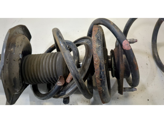 Стойка амортизатора Mitsubishi Outlander XL 2006-2012