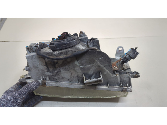 Фара передняя Toyota Corolla 1992-1997 левая