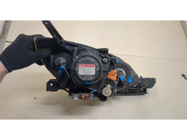 Фара передняя Mazda 3 (BK) 2003-2009 левая