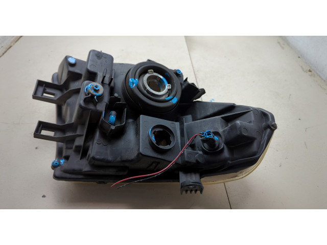 Фара передняя Nissan Pathfinder 2004-2014 левая