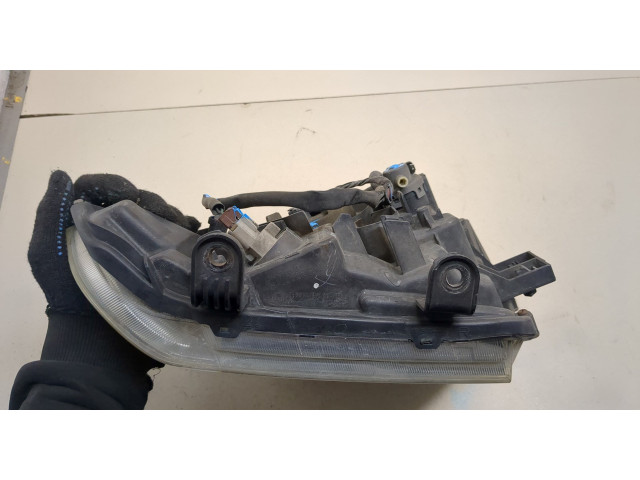 Фара передняя Nissan Pathfinder 2004-2014 правая