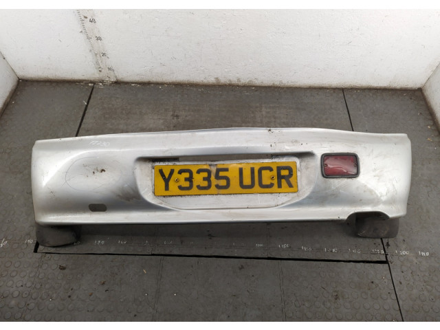 Бампер  Mitsubishi Colt 1996-2004 задний   MR273517