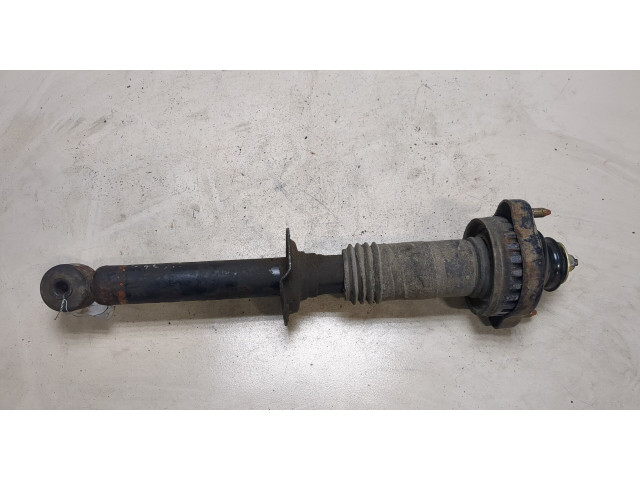 Стойка амортизатора Mitsubishi Colt 1996-2004 MR244447, MB871085 1.3 бензин