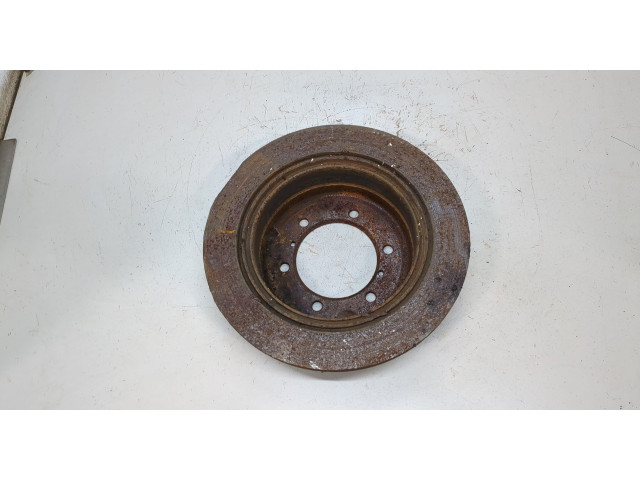 Диск тормозной Mitsubishi Montero Sport / Pajero Sport 1996-2008 задний MB618797