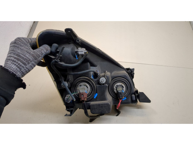 Фара передняя  Toyota Corolla Verso 2004-2009 левая 