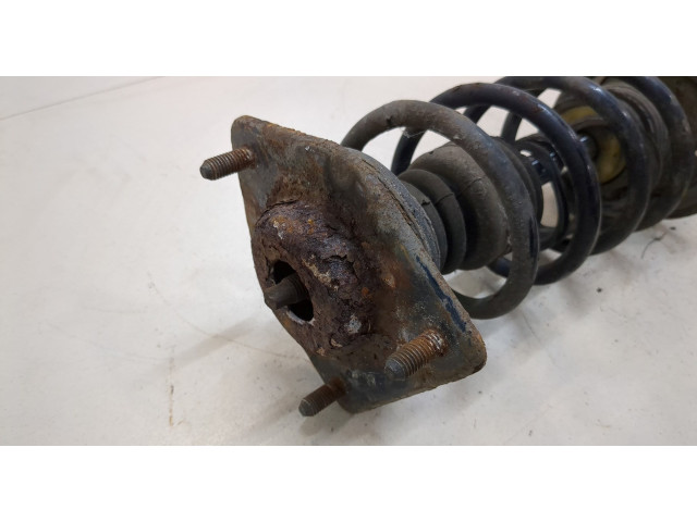 Стойка амортизатора  Mitsubishi Colt 2004-2008      