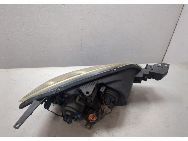 Фара передняя Mazda 3 (BK) 2003-2009 левая