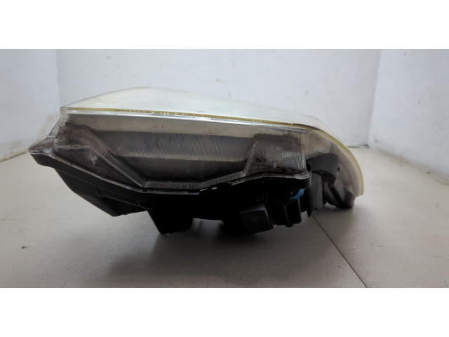 Фара передняя Nissan Pathfinder 2004-2014 левая