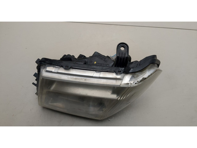 Фара передняя Nissan Pathfinder 2004-2014 левая