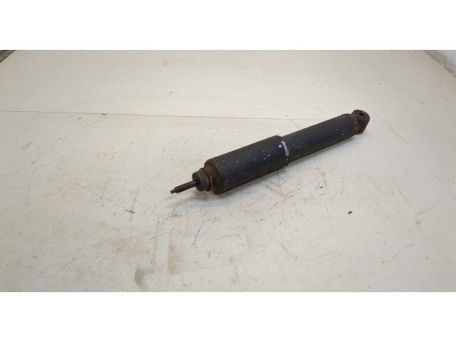 Стойка амортизатора Mitsubishi L200 1996-2006