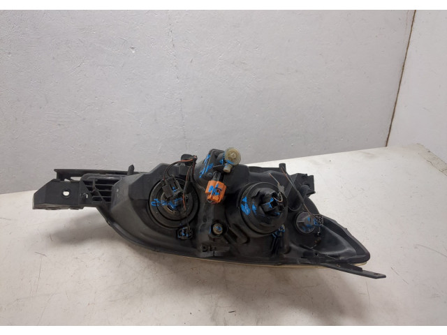 Фара передняя Mazda 3 (BK) 2003-2009 левая