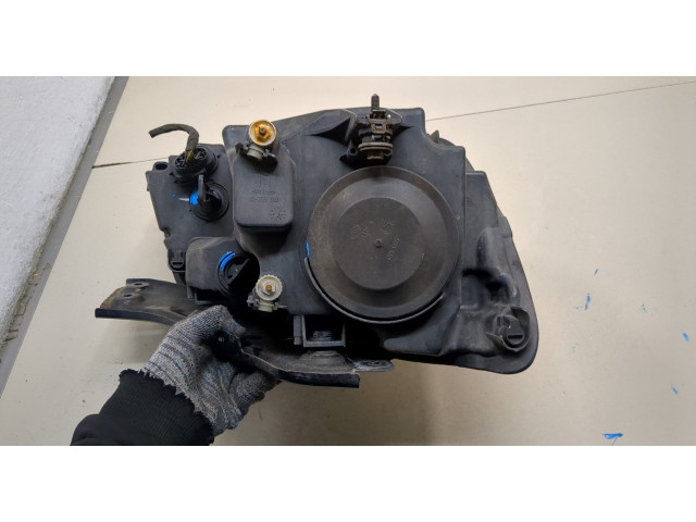 Фара передняя  Volkswagen Caddy 2004-2015 левая 