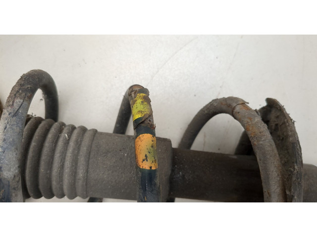 Стойка амортизатора Dacia Logan 2004-2012