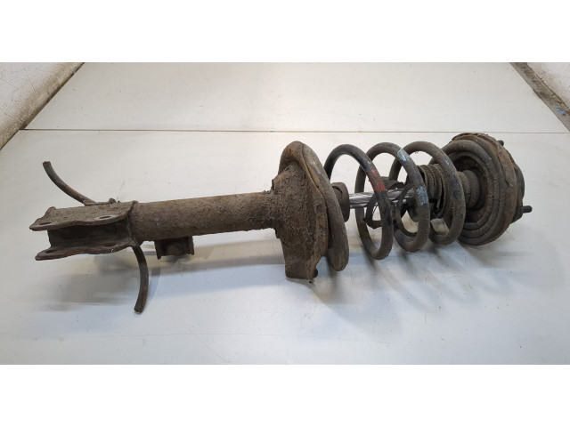 Стойка амортизатора  Nissan X-Trail (T30) 2001-2006      