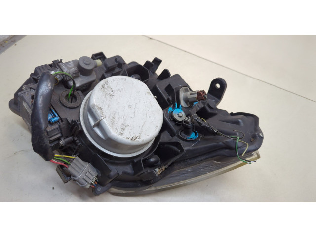 Фара передняя Nissan Pathfinder 2004-2014 правая