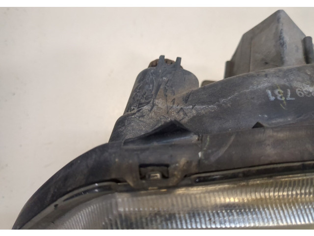 Фара передняя Mitsubishi L200 1996-2006 левая