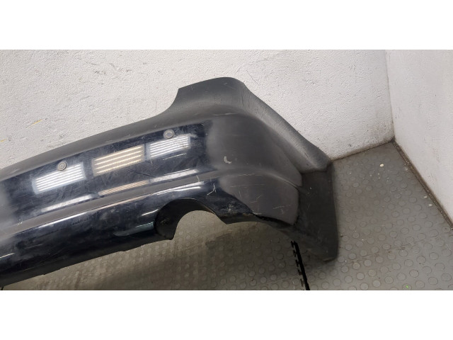 Бампер Mitsubishi Grandis задний