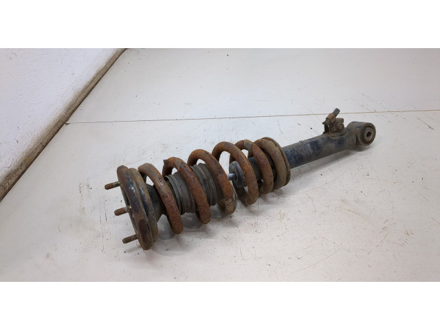 Стойка амортизатора Mitsubishi L200 2006-2015 MR992321, MR992336