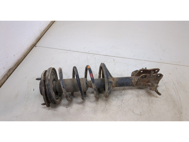 Стойка амортизатора  Mitsubishi Colt 1996-2004      