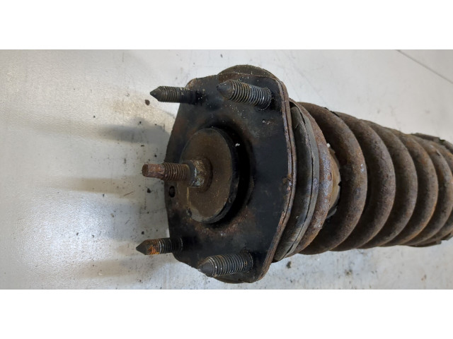 Стойка амортизатора  Jeep Commander 2006-2010      