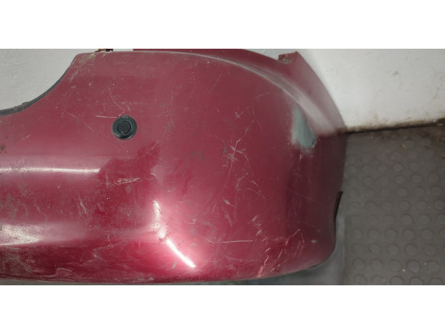 Бампер  KIA Carnival 1998-2006 задний   