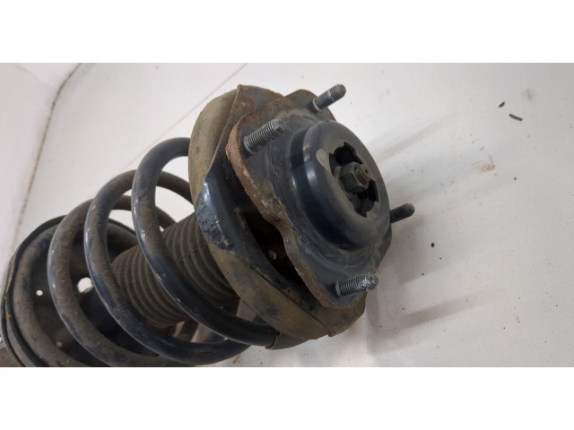 Стойка амортизатора  Mazda 323 (BJ) 1998-2003      