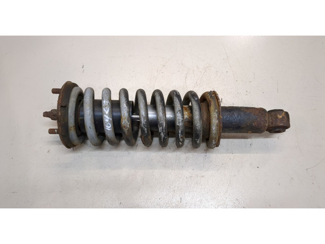 Стойка амортизатора Nissan Pathfinder 2004-2014