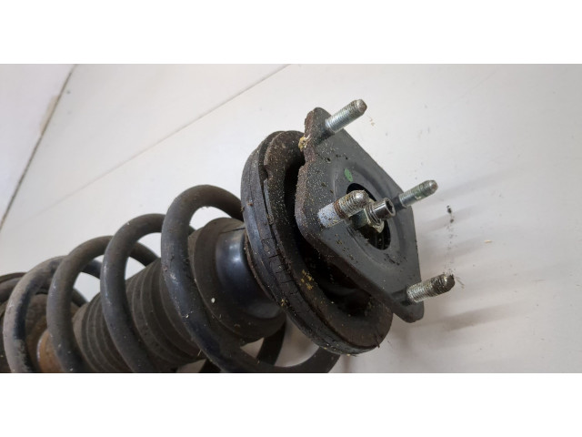 Стойка амортизатора  Mazda CX-7 2007-2012      