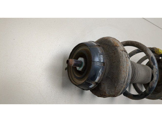 Стойка амортизатора Dacia Logan 2004-2012