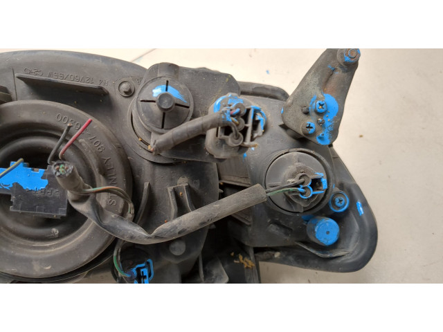 Фара передняя Mitsubishi L200 2006-2015 левая