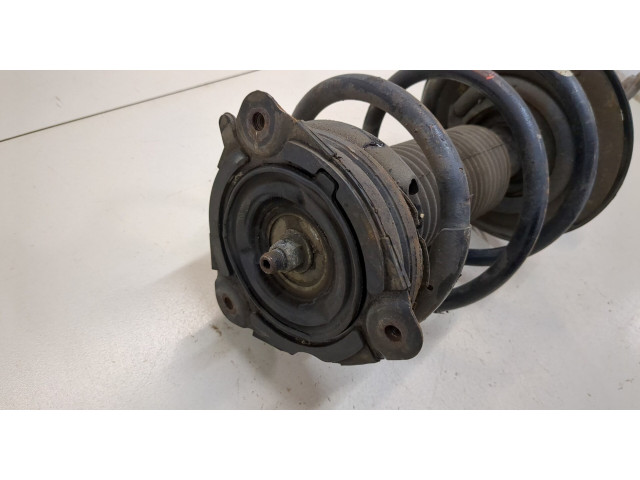 Стойка амортизатора Nissan Pathfinder 2012-2017