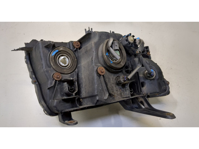 Фара передняя Mitsubishi Pajero 2006-2011 левая