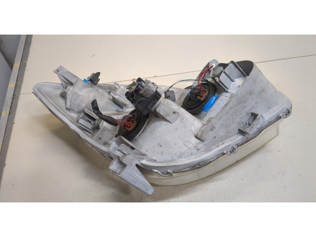 Фара передняя Toyota Corolla Verso 2002-2004 левая